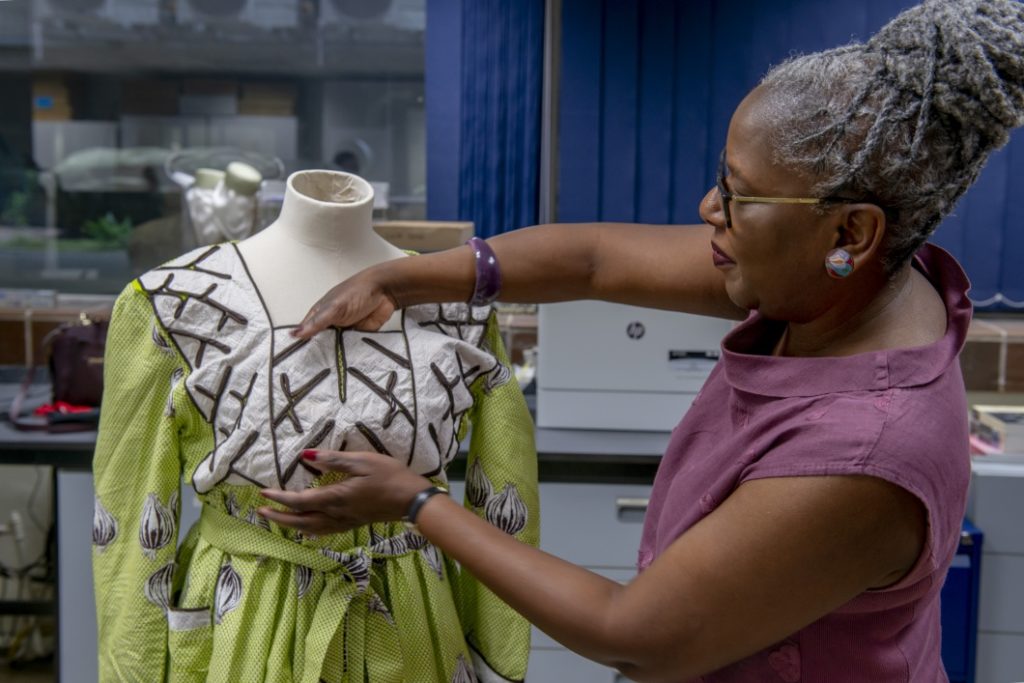 Iyamide Thomas setting up a Krio Dress